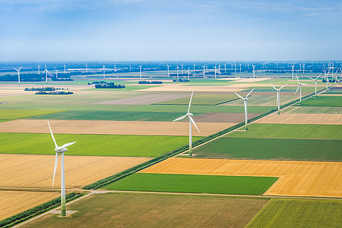 Landscape with wind turbines Several wind turbines are located in fields